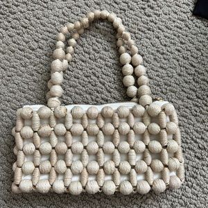 Cult Gaia shoulder bag in off white with twine beaded detail